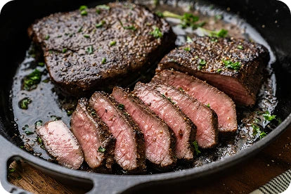 Cattle grazing in golden hour ranch landscape
